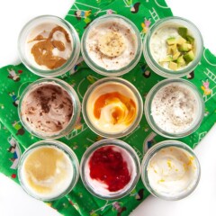 9 small jars of yogurts with fun mix-ins (sugar free).