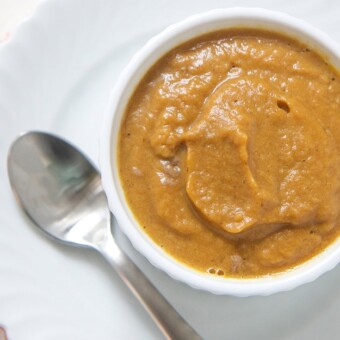 Beef sweet potato combination puree in a small white bowl.