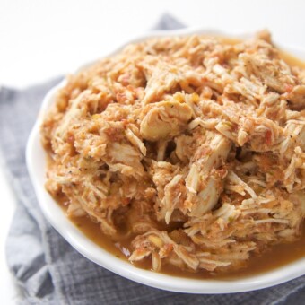 A bowl of cheesy slow cooker salsa chicken.