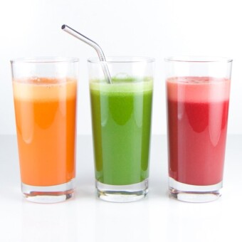 Three colorful and kid friendly immunity boosting juices on a white background.