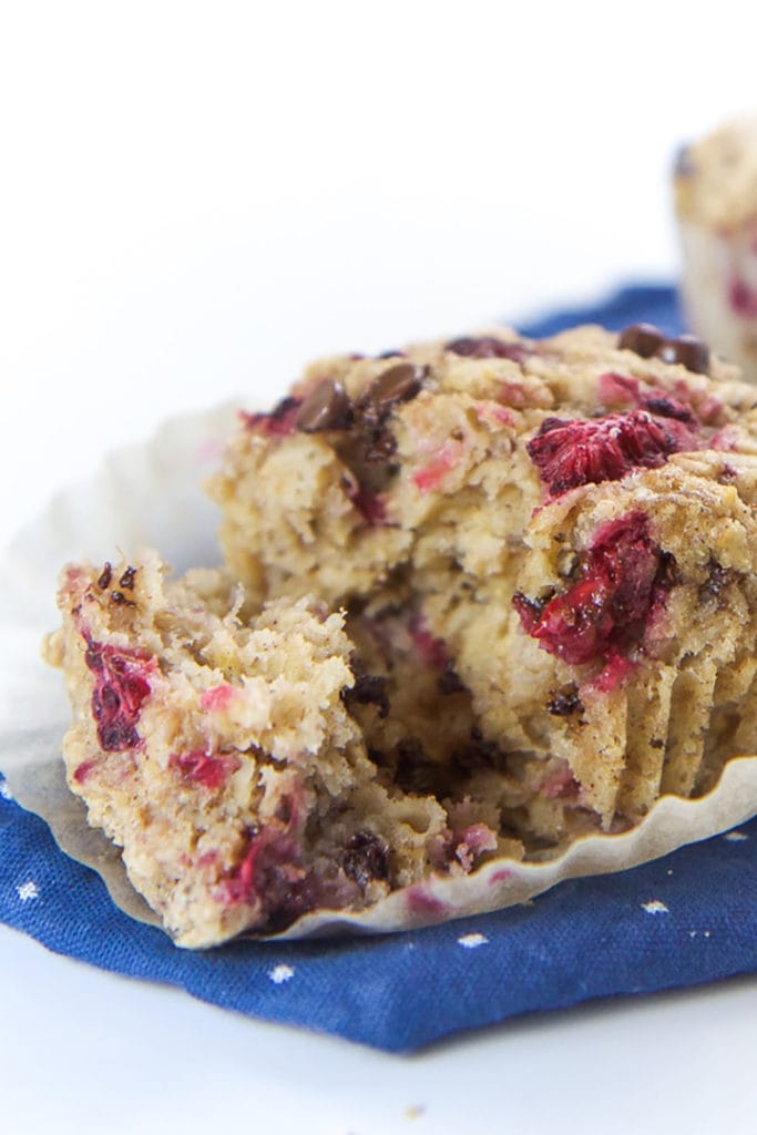 Oatmeal muffin cup with raspberries and chocolate.