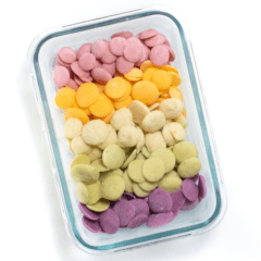 graphic for post - glass container with a rainbow of yogurt melts