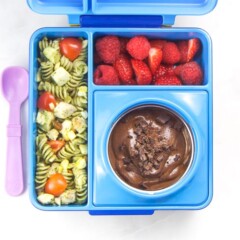 Blue bento box filled with a healthy school lunch.
