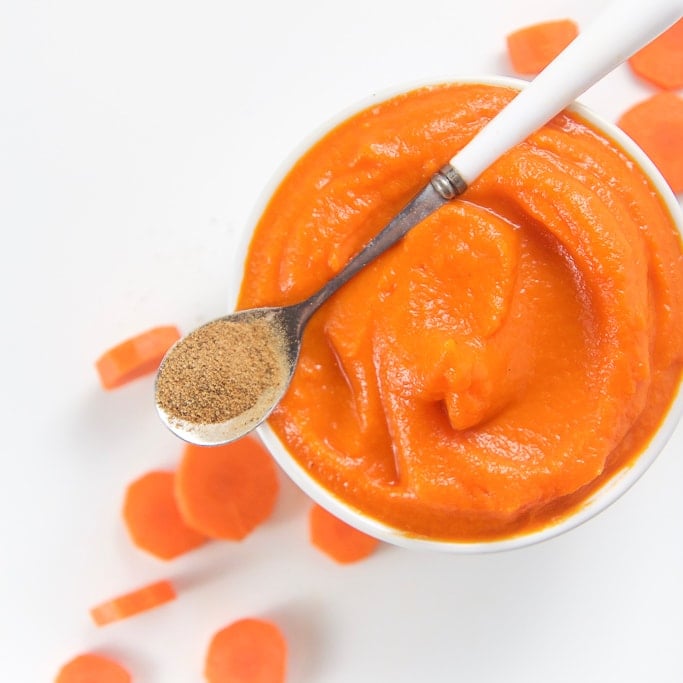 bowl filled with a creamy carrot puree.