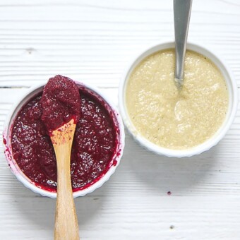 2 small white bowls full of summer baby food purees.