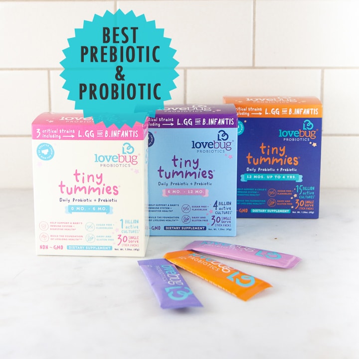 3 boxes of probiotics lined up on a kitchen counter for infant.