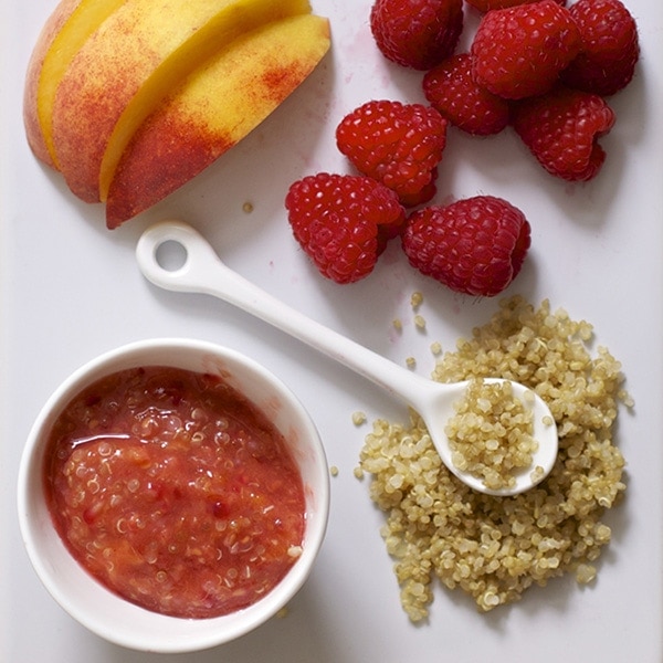 chunky puree for baby with raspberry and quinoa. 