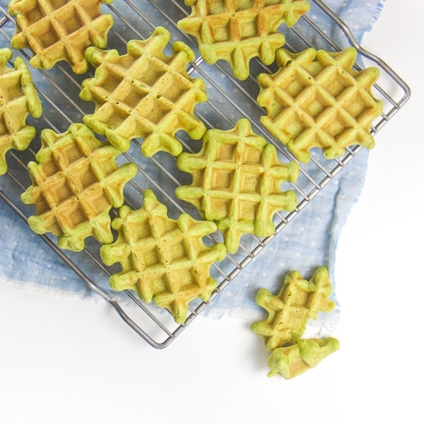 Spinach waffles for Baby led weaning on a cooling rack.