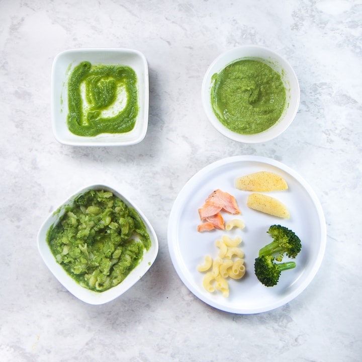 Spread of the different baby food stages one, two, three and baby-led weaning or finger food stage.