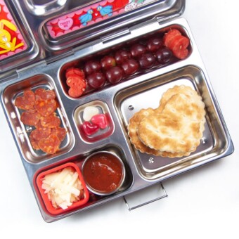 School lunch box with healthy diy heart pizza punchable.