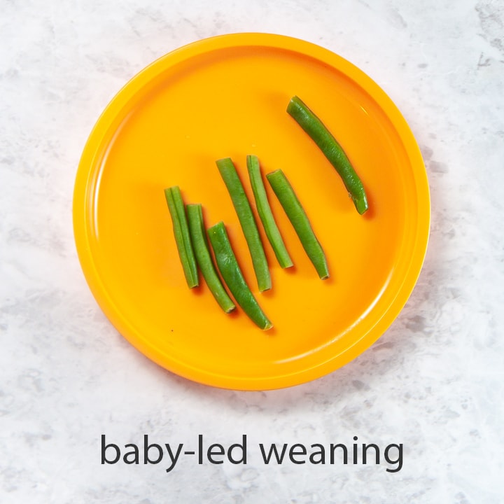 steamed green beans are a great option for baby led weaning.