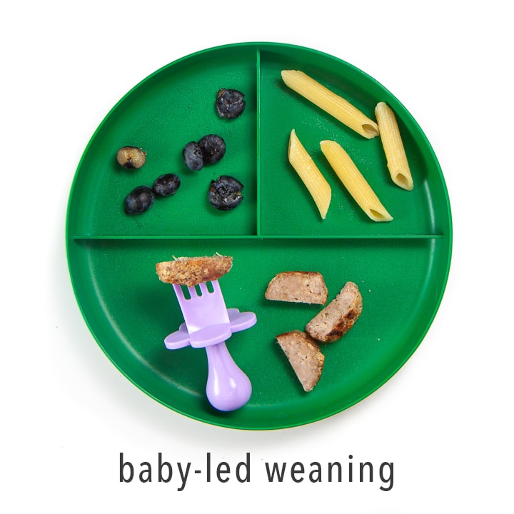 An image showing you how you can serve these chicken parmesan meatballs to baby, especially if you are doing baby-led weaning.