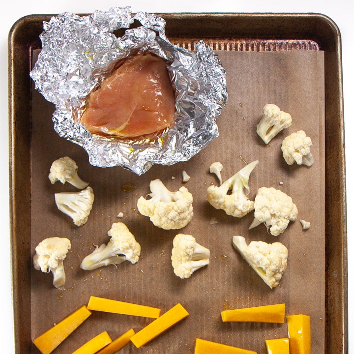 sheet pan with ingredients for baby's dinner.