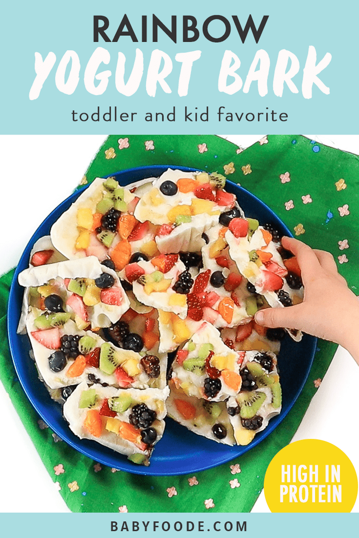 Graphic for post - rainbow frozen yogurt bark - toddler and kid favorite - high in protein. Image is of kids hand reaching into a pile of frozen yogurt bark.