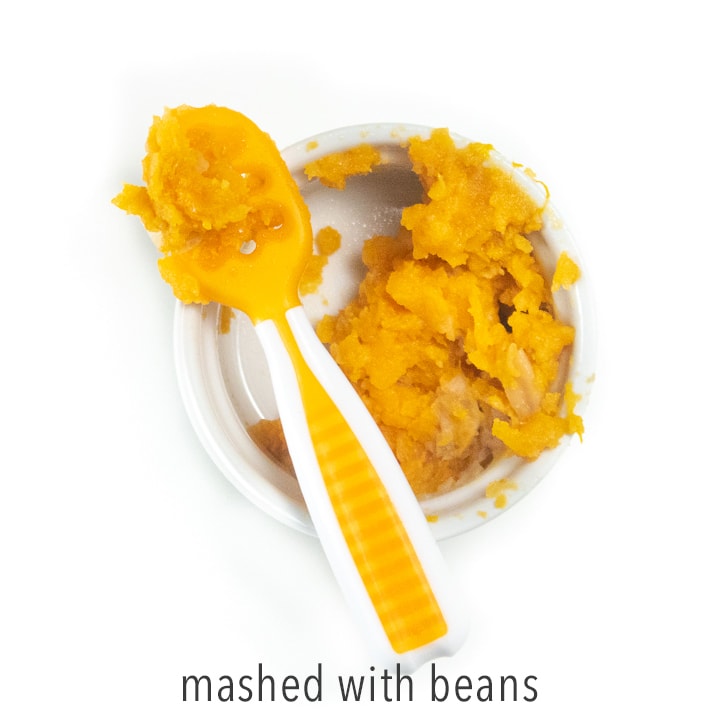 mashed sweet potato puree for baby with a self feeding spoon.