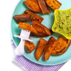 Plate full of sweet potato wedges for baby with a fun dip.