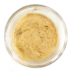 Bowl of batter for easy mini applesauce muffins.