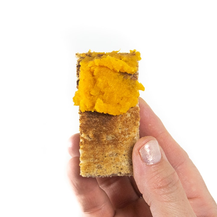 Sweet potato smeared on a piece of toast for a great way to serve for baby-led weaning. 