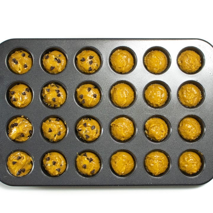 Healthy mini muffins in a muffin tin.
