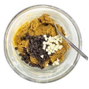bowl filled with cookie bar dough and chocolate chips.