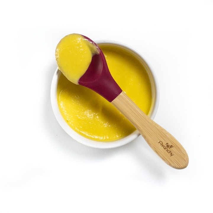 small bowl of purees mango and eggs in a smooth puree.