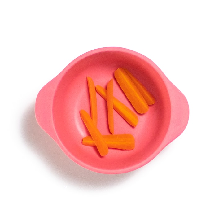 bowl of steamed carrots for baby. 