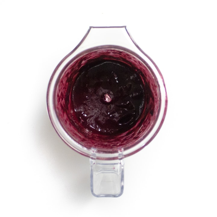 Blender with roasted blueberry puree inside.