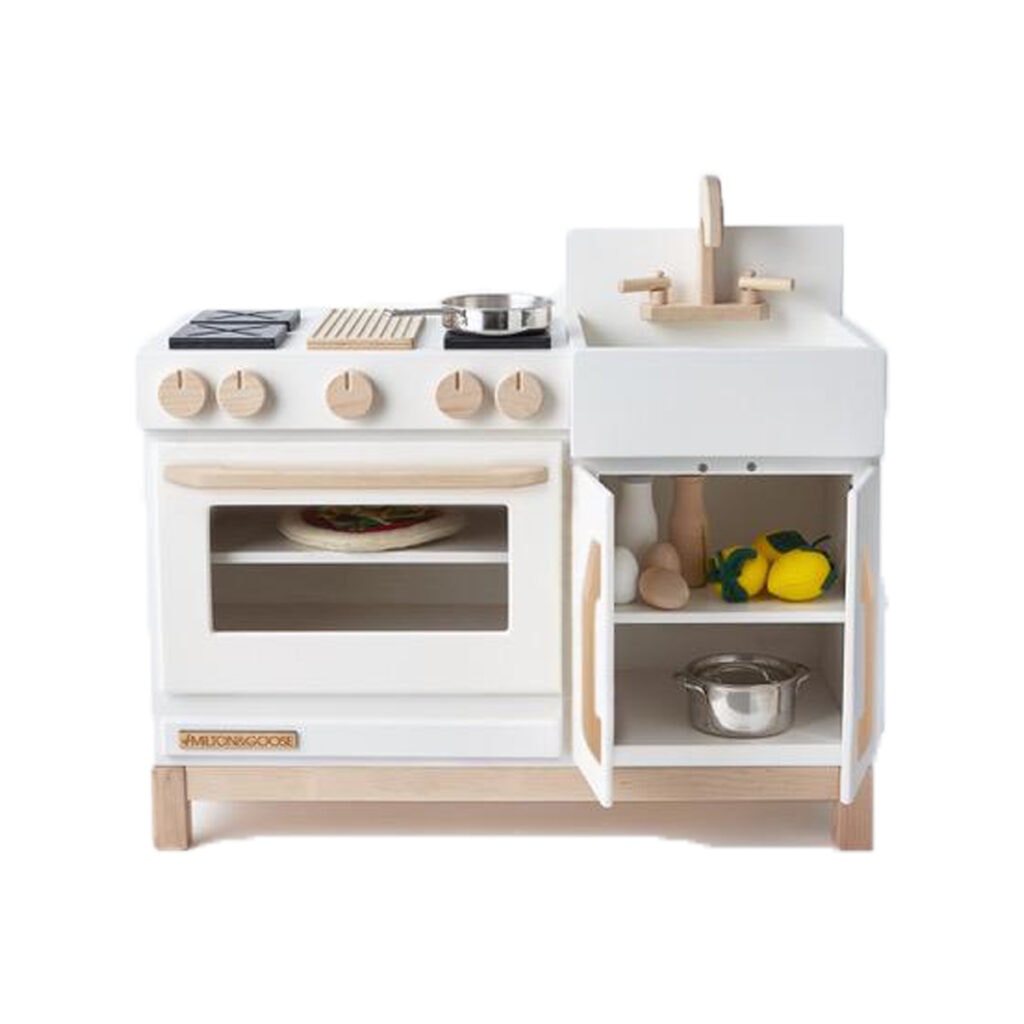 White and wood luxe play kitchen. 