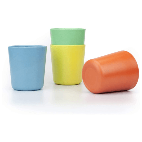 4 colorful cups scattered around white background. 