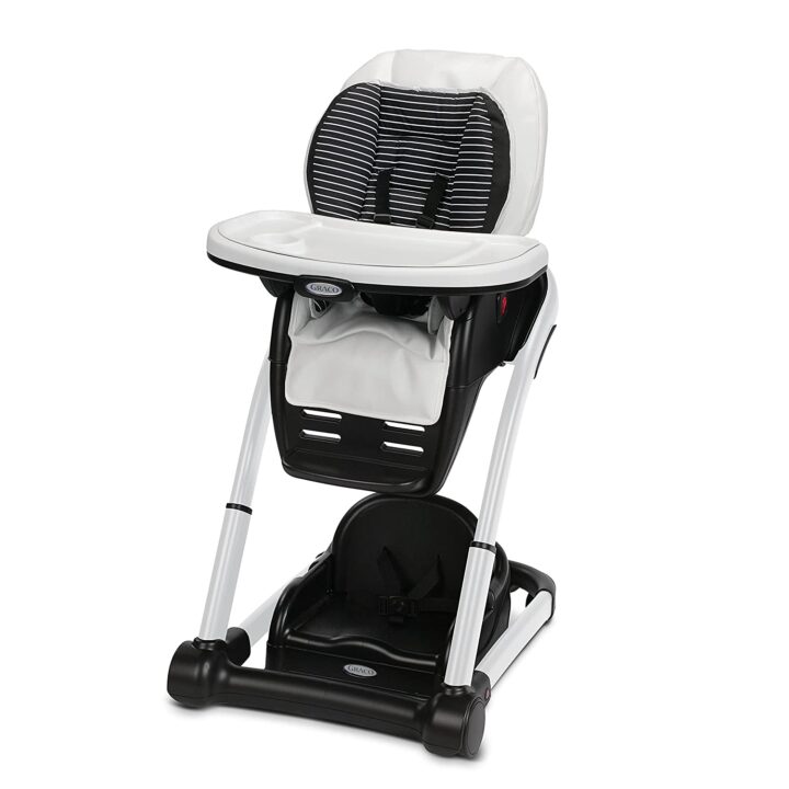 A black and white Graco high chair against a white background that is convertible and has six height positions.