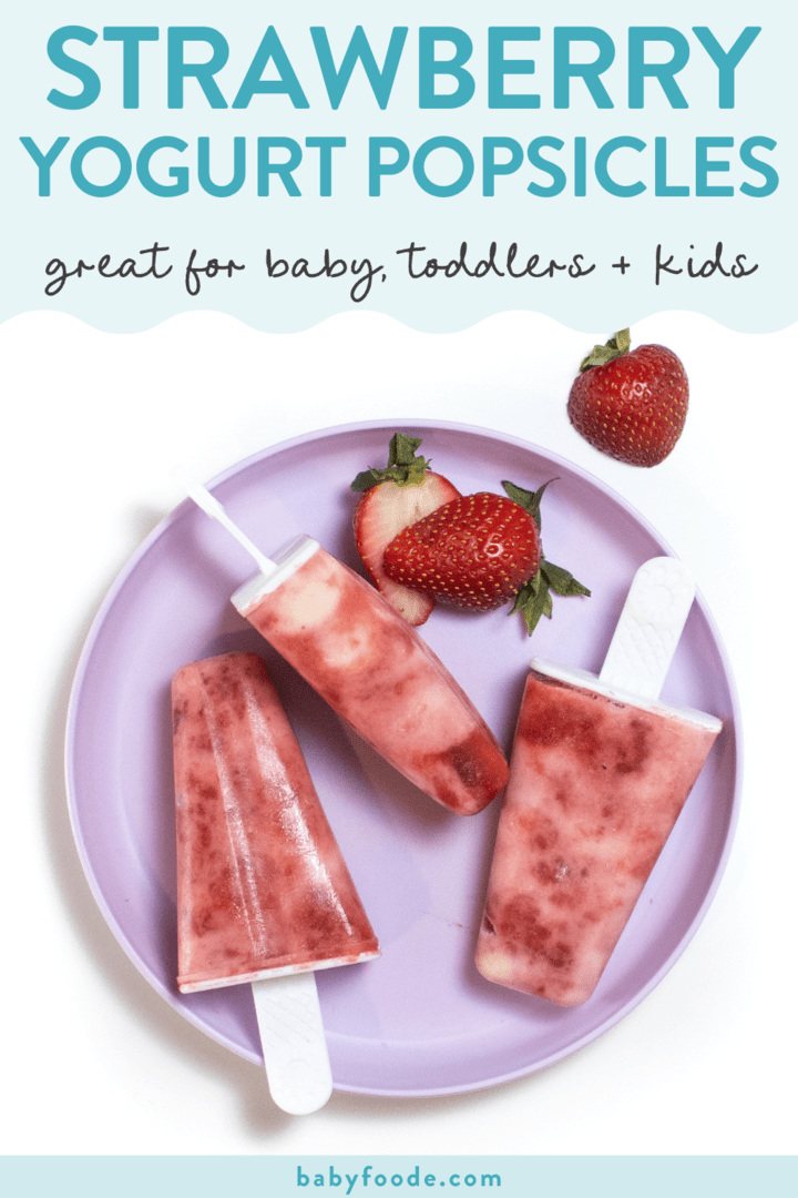 Graphic for post – strawberry yogurt popsicles, great for baby, toddler and kids. Image is of a purple toddler play with three swirls strawberry yogurt popsicles and sliced strawberries scattered around a white background.