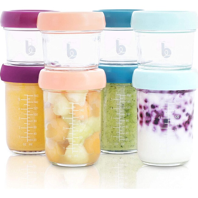 Set of 8 glass jars with colorful lids. 
