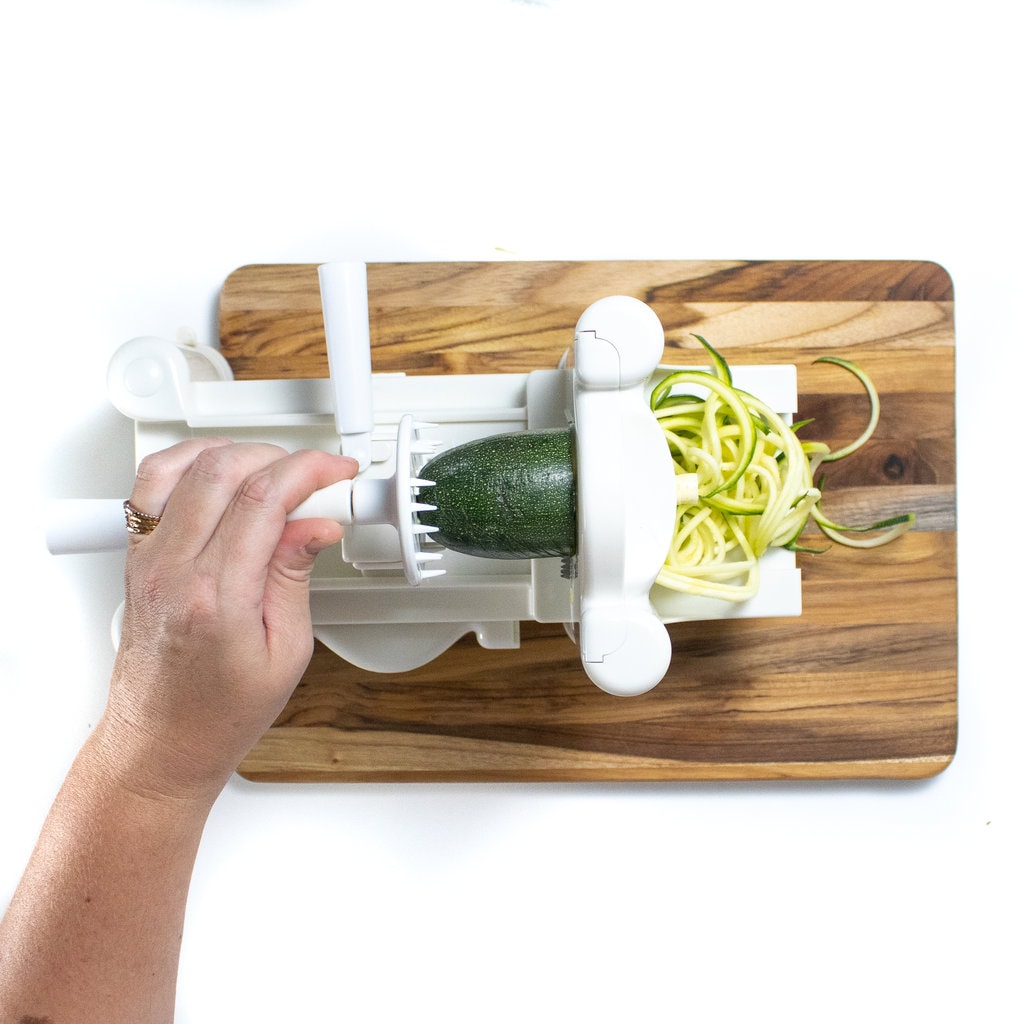 And inspiralizer making spiral zucchini