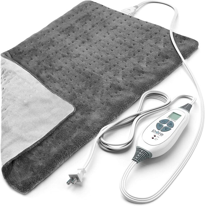 gray heating pad and cord against a white background