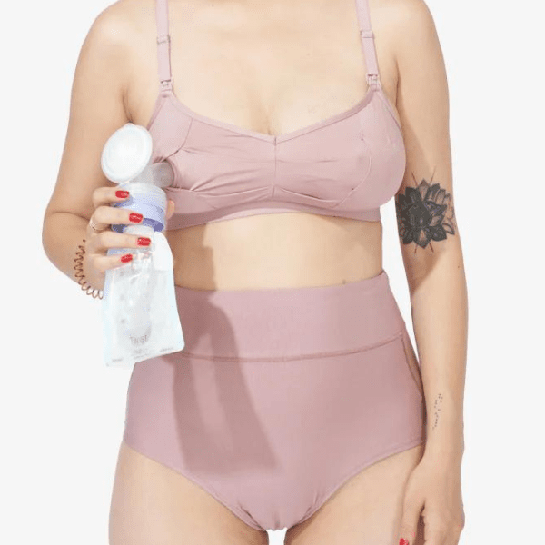 woman pumping while wearing comfortable pale pink underwear