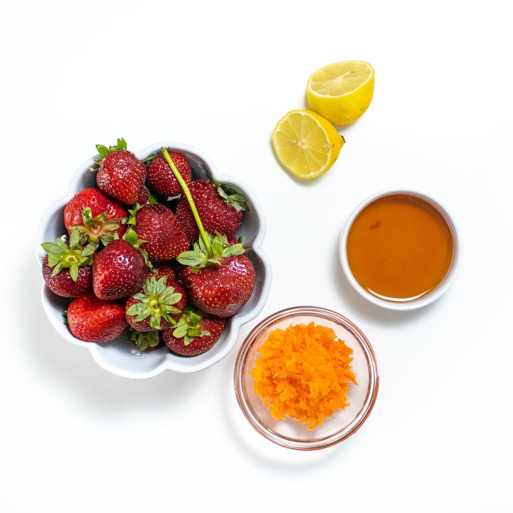 Sprite ingredients for strawberry popsicles, strawberries, lemon, honey, shredded carrots..