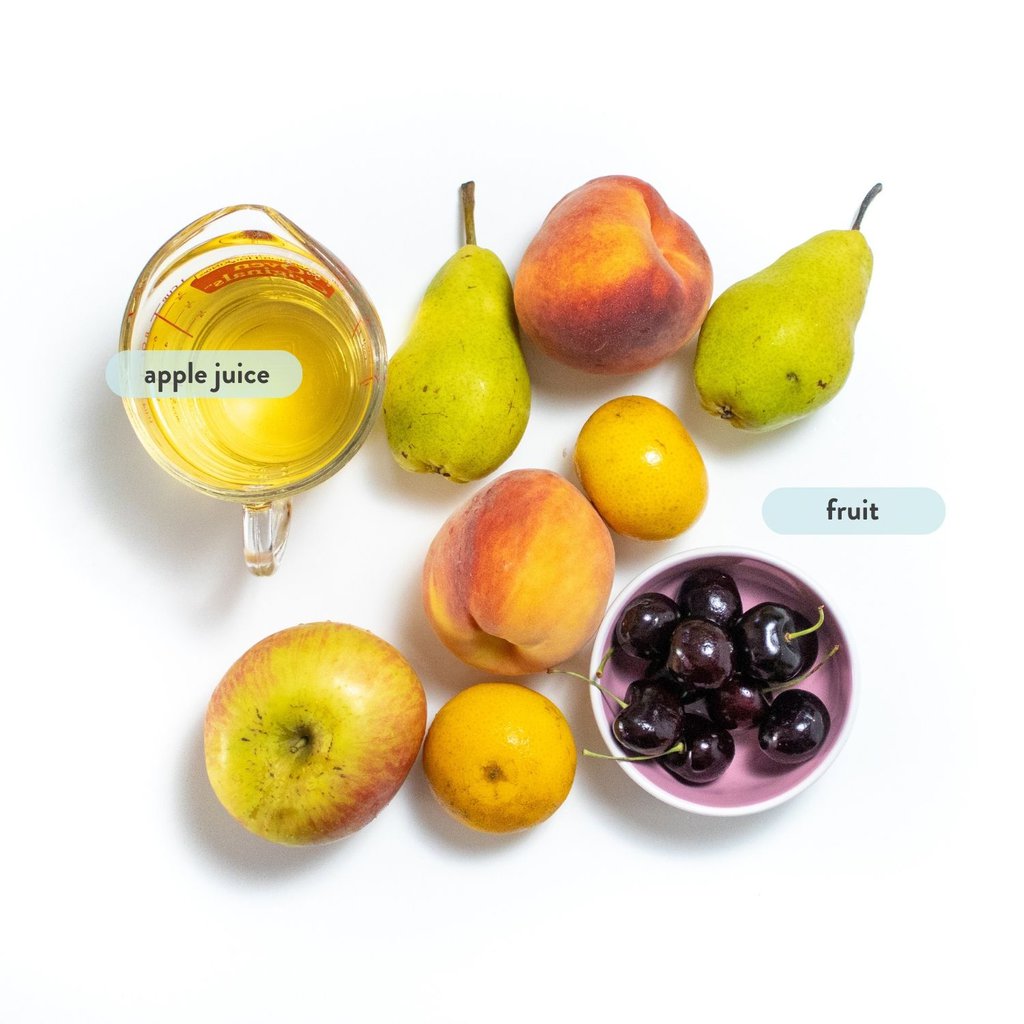 graphic for post- spread of fruit and ingredients for fruit cups on a white countertop with text next to them. 