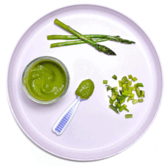 A purple baby play with different ways to serve asparagus to Baby as a purée, or for baby led weaning.