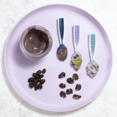 Purple baby plate with self-feeding spoons showing different ways to serve black beans to baby.